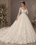 Deklaire Bridal 519 Illusion Long Sleeve Ball Gown Wedding Dress with Beaded Lace Appliqué & Chapel Train
